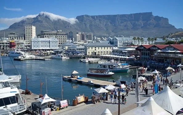 The waterfront in Cape Town offers relatively inexpensive residences, great food, retail and night life, but the political unrest is considerable.
