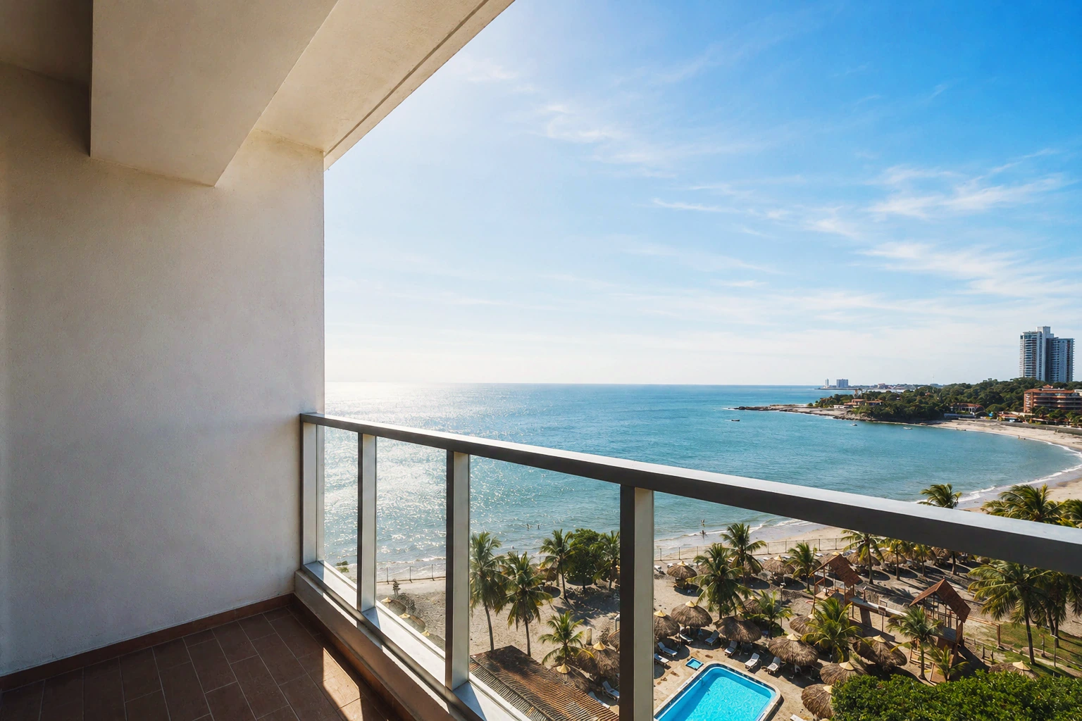 View from a Royal Palm balcony over the beach and pool deck