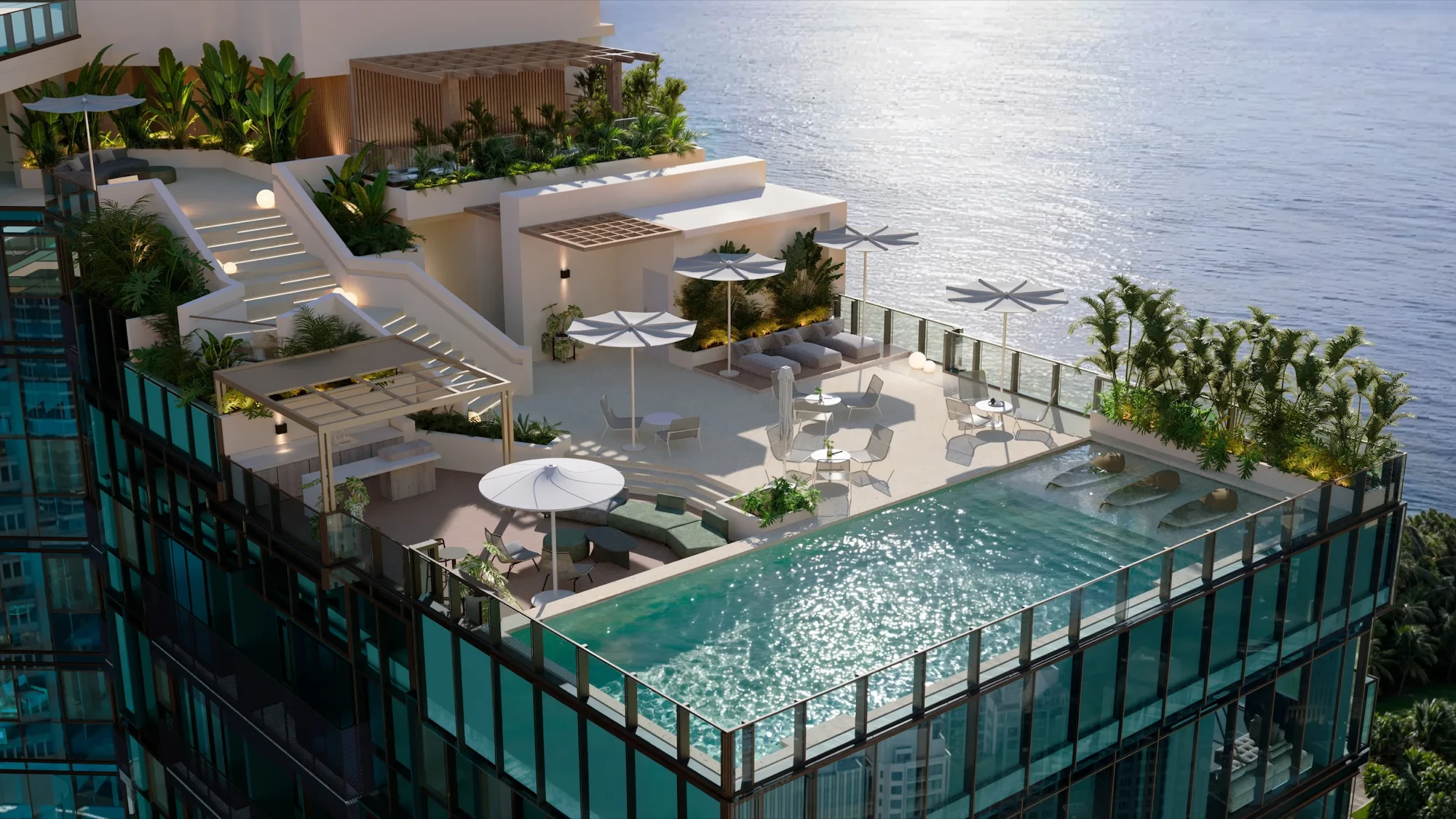The Generation Tower rooftop deck seen from above, an infinity pool and shaded terraces on the tower's crown, Panama Bay beyond