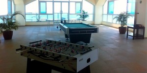 Part of the rooftop game room at Coronado Golf!